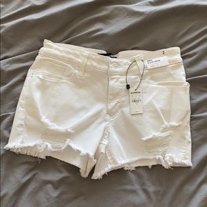 White cut off Express stretch shorts